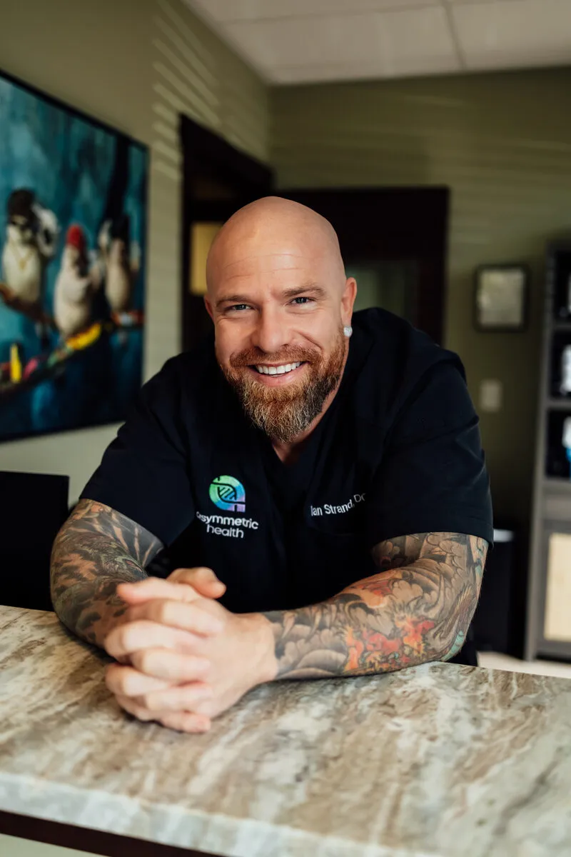 Dr. Ian Strand, DO, FAAMM, Clinical Director and Founder of Asymmetric Health in Lacey, WA