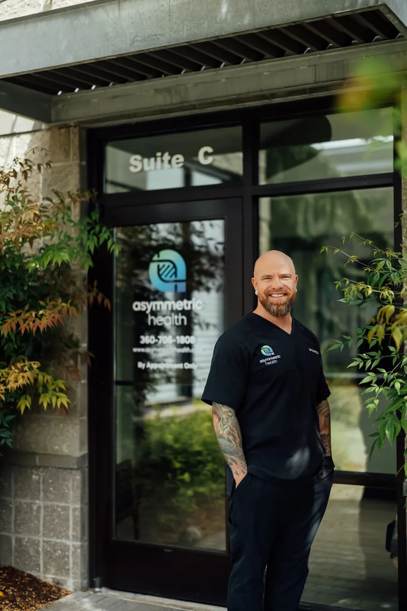 An Asymmetric Health provider outside the Suite C clinic entrance in Lacey, WA