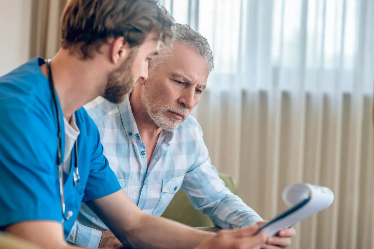 Medical professional investigating root cause of erectile dysfunction